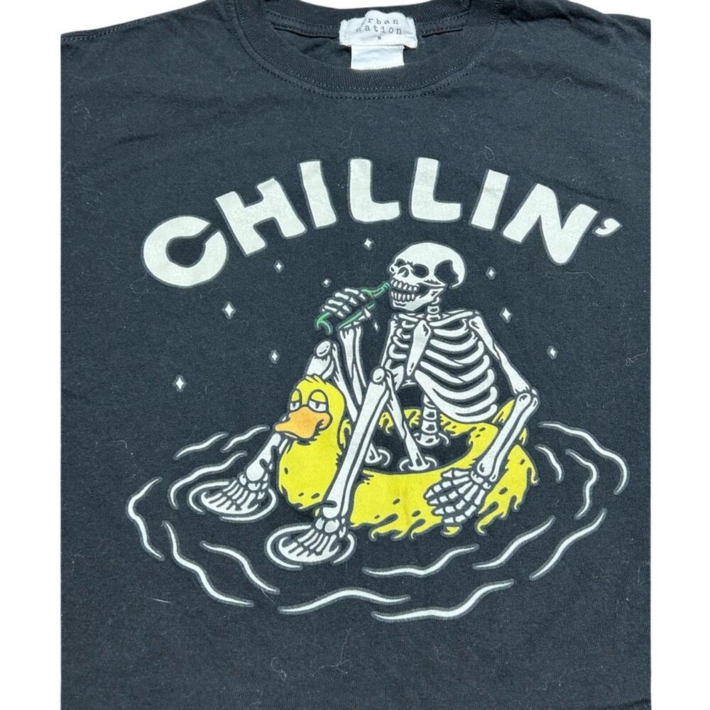 Urban Nation Chillin' Halloween Graphic Cropped t-shirt skeleton relaxing